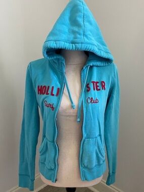 Hollister Turquoise & Red Zip Up Hoodie -
FLAWED